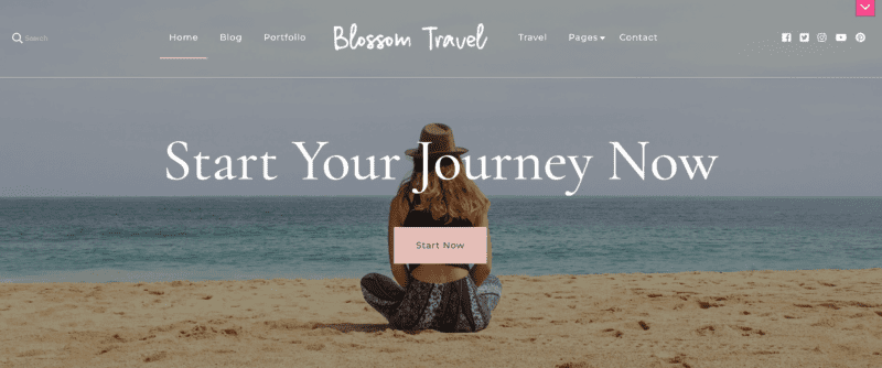 Blossom Travel demo site. White text overlaying the background image of a person sitting on the beach