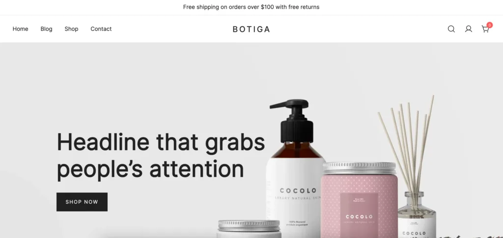Botiga demo site, a free feminine WordPress theme. Beauty products make up the background image, alongside black text and a black button.