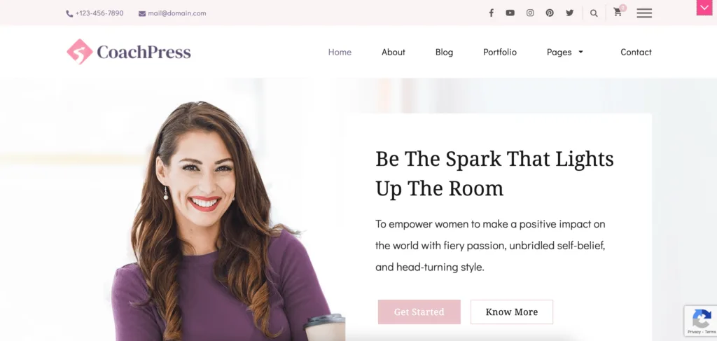 CoachPress Lite feminine WordPress demo site, with white and pink accents